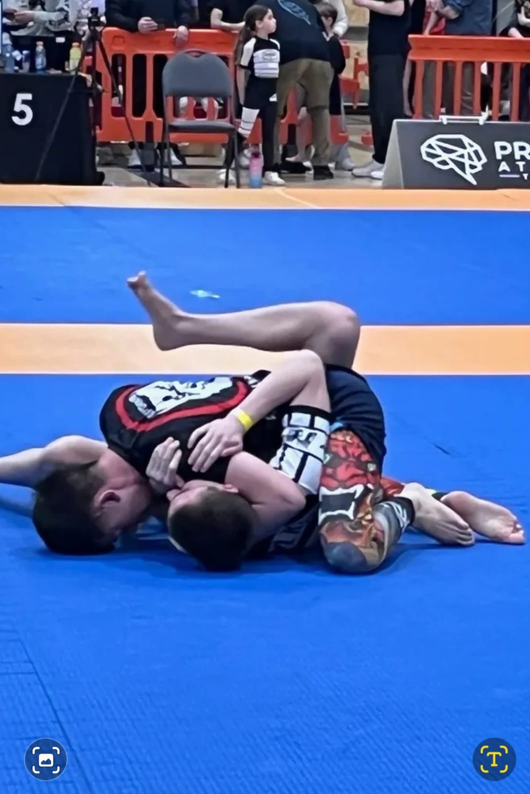 A young Silverback grappler competing in a NoGi tournament