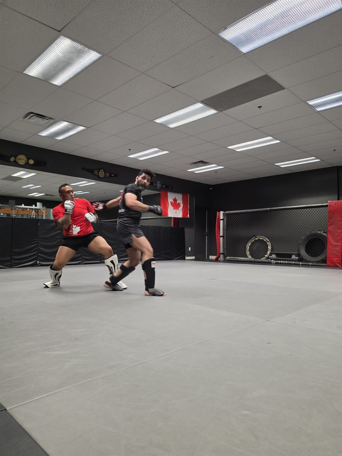 Two students sparring during kickboxing class at Silverback